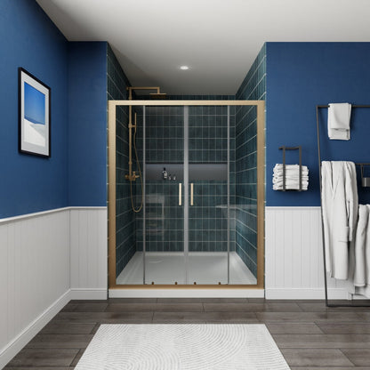 Modern bathroom with a glass shower enclosure, blue walls, and white fixtures.