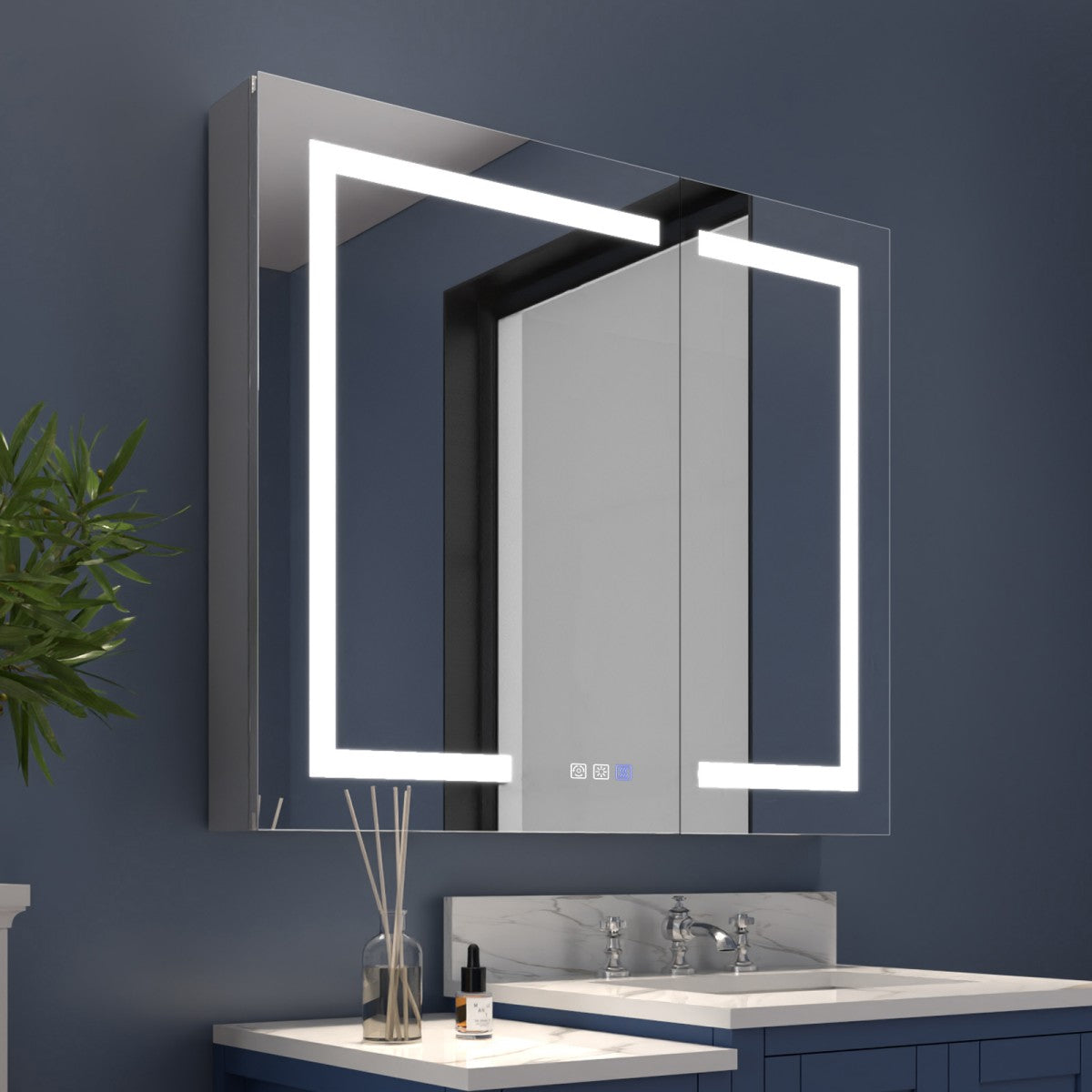 Bathroom vanity with illuminated mirror and dark blue wall
