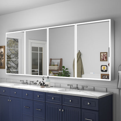 Bathroom vanity with large mirror, blue cabinets, and white countertop.