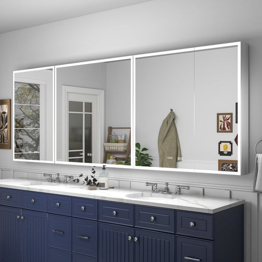 Bathroom vanity with large illuminated mirror, blue cabinets, and white countertop.
