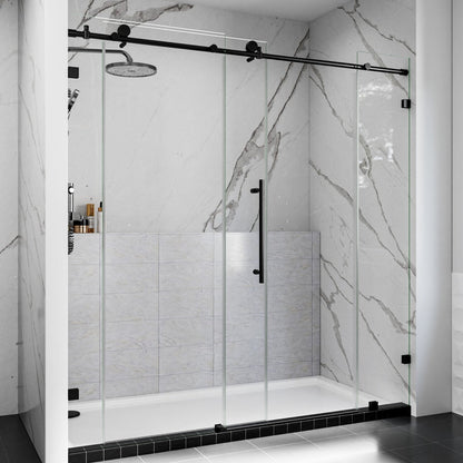Modern shower enclosure with glass door and marble-patterned walls.