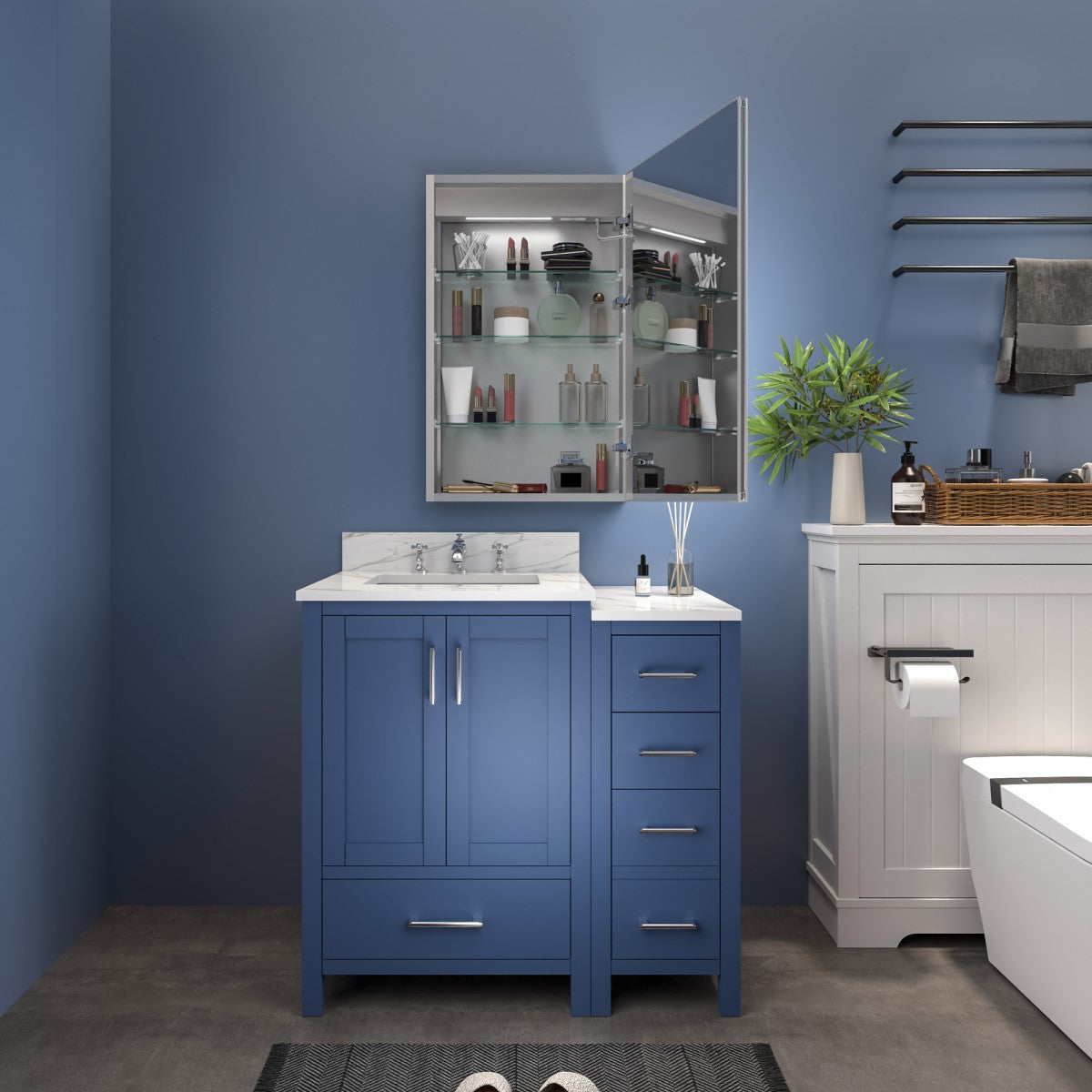 Bathroom with blue vanity, white countertop, and mirror.