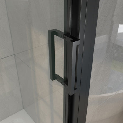 Black shower door handle on a glass panel with tiled wall background