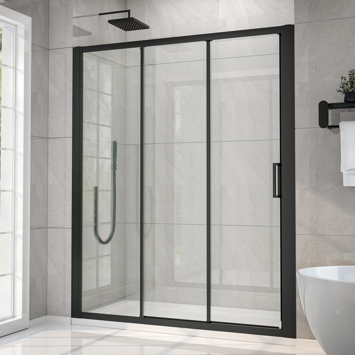 Modern shower enclosure with black frame in a bathroom setting